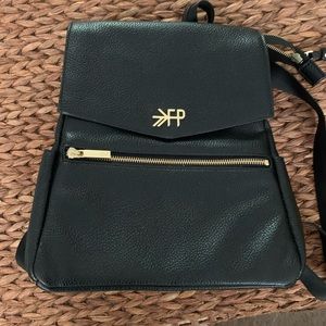 Freshly picked mini backpack/diaper bag. Excellent condition.
